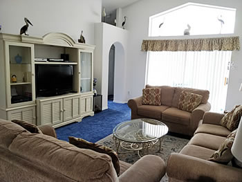 Comfortable Lounge with Digital Cable TV, Hi-Fi, DVD, VCR and a selection of DVD's and Video's