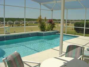 The pool and views over the golf course and on into the nature reserve