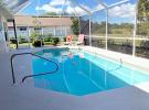 A beautifully appointed 4 bedroom, 2 bathroom home with private electrically heated pool, situated in Rotonda West overlooking a greenbelt and small lake on the Long Marsh golf course.