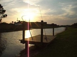 Fishing deck and river at sunset