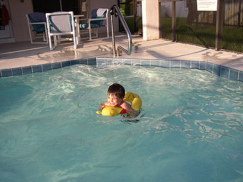 Our grandson enjoying the pool