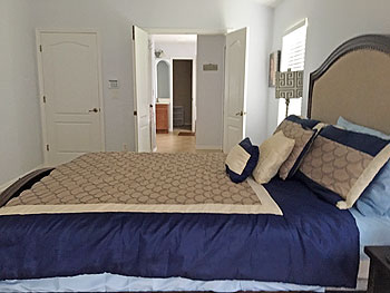 WHAT BETTER WAY TO END THE DAY.  SUPER COMFY BED AND SO TRANQUIL.  JUST WHAT IS NEEDED AFTER A LONG DAY.  LEADING ONTO AN EQUALLY IMPRESSIVE MASTER ENSUITE.  WORTHY OF A 5* HOTEL.  OFF OF THIS IS A HUGE WALK IN CLOSET.  JUST PERFECT FOR ALL OF THOSE FABUL