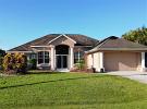 Tranquil lakeside home with a south facing deck, pool and spa