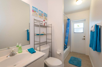 Second bathroom, accessible from both the Living Area and Pool Deck